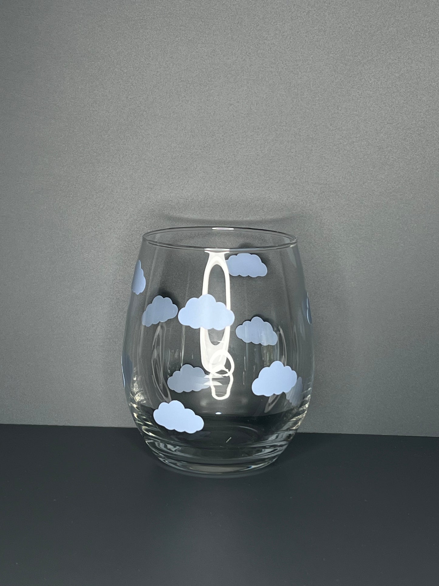 Trinkglas mit Wolken