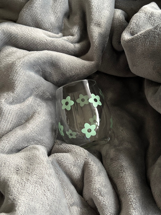 Trinkglas mit Blumen